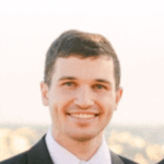 Headshot of a male in a dark suit